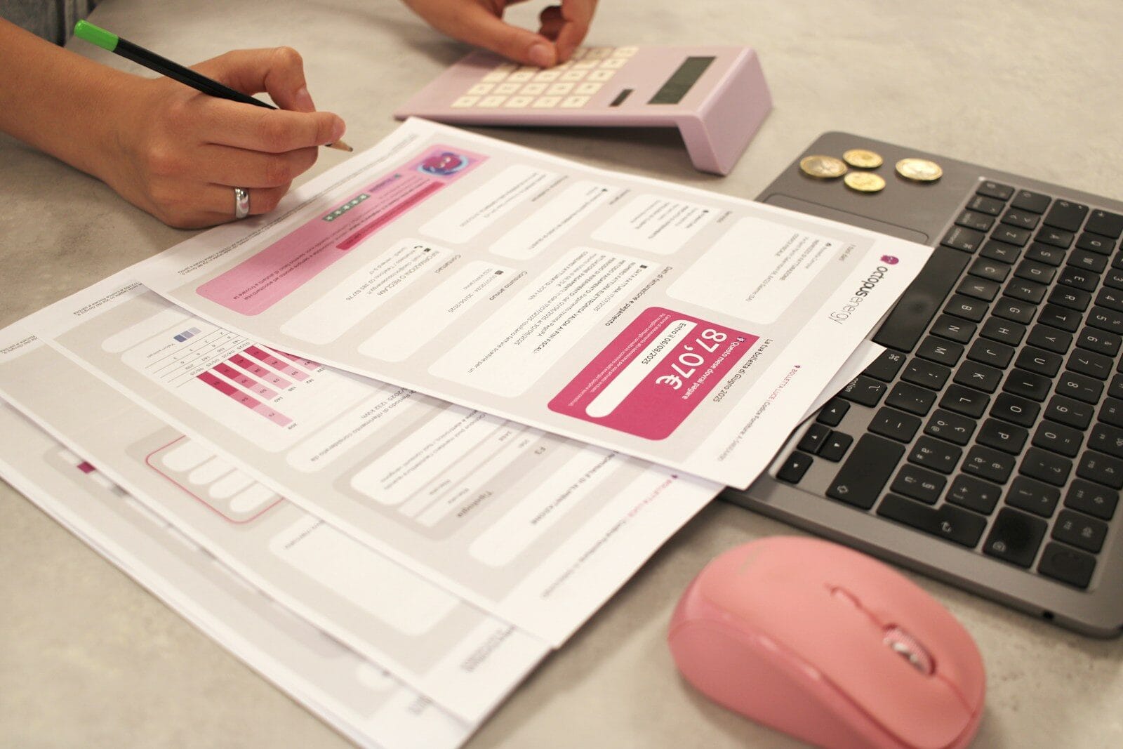 How to Tailor Your Resume to a Job Description (Fast & Free) 1 Someone is doing taxes with a calculator and laptop.