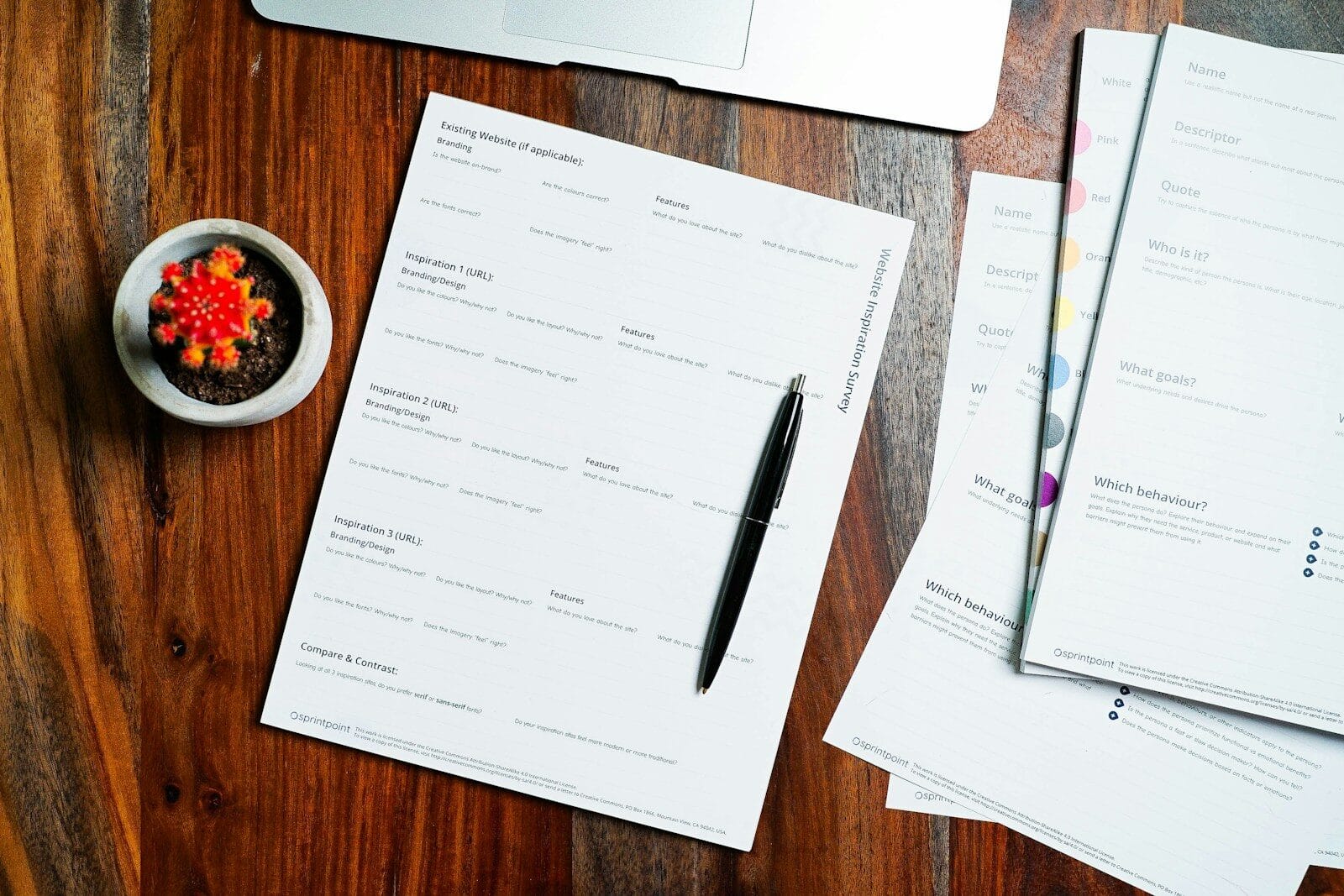 Why Your Resume Gets Rejected by ATS (And How to Fix It) 1 a wooden table topped with papers and a pen